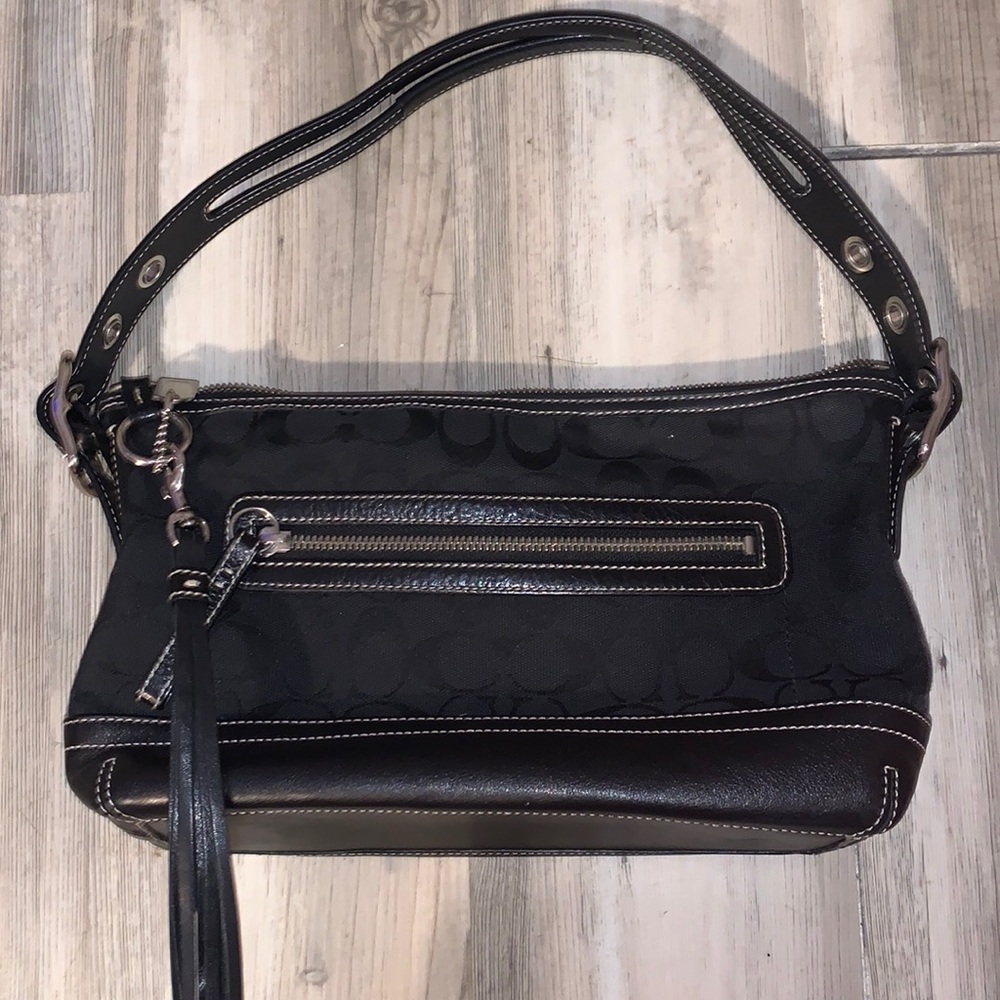 Vintage coach bad so it’s not new! but still very cute!